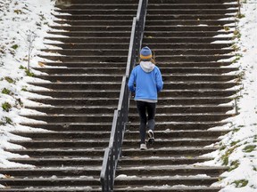 A runner jogs up the stairs in Parc-La-Fontaine in Montreal.