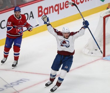 Colorado Avalanche's Valeri Nichushkin (13) celebrates his goal in front of Montreal Canadiens' Jonathan Drouin (92) during second period in Montreal on Thursday, Dec. 2, 2021.