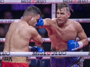 Granby's Yan Pellerin, right, score a unanimous 10-round decision against Francisco Rivas Friday night at the Bell Centre.