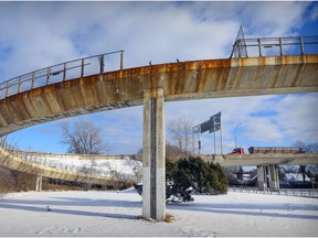 A pedestrian walkway over Highway 20 in Pointe-Claire, damaged in a deadly crash last December, recently reopened following repair work