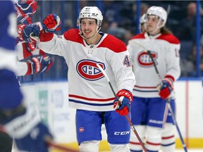 Quebec native and Canadiens seventh-round draft pick Rafael Harvey-Pinard celebrates scoring a goal in his NHL debut Tuesday night in Tampa.