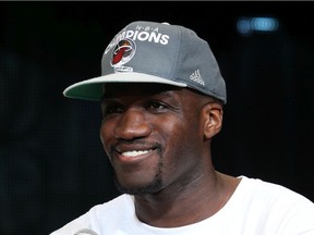 Miami Heat's Joel Anthony addresses the crowd during a rally for the 2012 NBA champion Miami Heat on June 25, 2012, at American Airlines Arena in Miami.