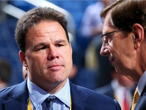 New York Rangers general manager Jeff Gorton, left, and Nashville Predators GM David Poile attend the 2016 NHL Entry Draft on June 24, 2016, in Buffalo.