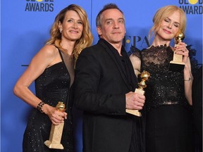 Jean-Marc Vallée with Big Little Lies stars Laura Dern, left, and Nicole Kidman at the 2018 Golden Globes. Both actors won trophies, and the HBO show won the award for best miniseries or television film.