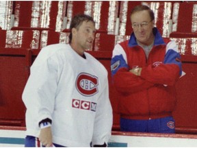 Head coach Jacques Demers seemed pleased to have Patrick Roy on the ice for the first day of the Montreal Canadiens' training camp at the Forum on Sept. 12, 1995.