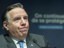 Quebec Premier Francois Legault speaks during a news conference in Montreal, Thursday, December 30, 2021, where he gives an update on the ongoing COVID-19 pandemic in the province.