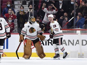 Bell Centre fans cheer for Blackhawks goalie and Sorel native Marc-André Fleury as he and teammate Jonathan Toews celebrate his 500th career win.