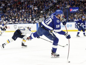 Tampa Bay Lightning's Corey Perry shoots against the St. Louis Blues during the first period at Amalie Arena in Tampa on Dec. 2, 2021.