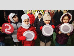 Teeter Tot preschoolers (from left) David Milton, Julian Martinez, Anathony Falgioni and Mariana Alonso prepare the help bury a time capsule ahead of the turn of the millennium outside the Côte-St-Luc recreation building.