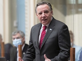 Quebec Premier François Legault responds to the opposition on the managing of the first wave of the COVID-19 pandemic in CHSLDs during question period Wednesday, December 8, 2021 at the legislature in Quebec City.