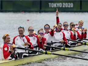 Lisa Roman, Kasia Gruchalla-Wesierski, Christine Roper, Andrea Proske, Susanne Grainger, Madison Mailey, Sydney Payne, Avalon Wasteneys and Kristen Kit of Canada celebrate winning the gold medal in the women's eight final at the 2020 Tokyo Summer Olympics on July 30, 2021.