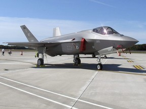 In this Sept. 19, 2019 file photo, an F-35 fighter jet arrives at the Vermont Air National Guard base in South Burlington, Vt.