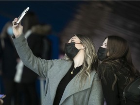 Vaccination was cause for a selfie at the Palais des congrès on Saturday January 8, 2022. While vaccinating as many people as possible is crucial to protect the population from severe illness and death, experts say, it should only be one part of a larger plan.