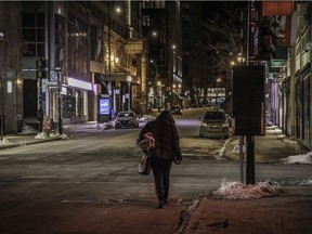 A homeless man walks on Metcalfe St. in January 2021.
