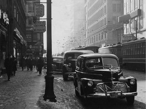 It's clear from the cars and streetcars, not to mention the bilingual signs and cigarette ads, that this photo from our archives, taken on Ste-Catherine St. near Peel St. and dated Jan. 10, 1942, is from another era.