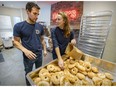 Mike and Spenser Dizgun in their Dizz's Bagel and Deli in Pointe-Claire Village, just south of Highway 20.