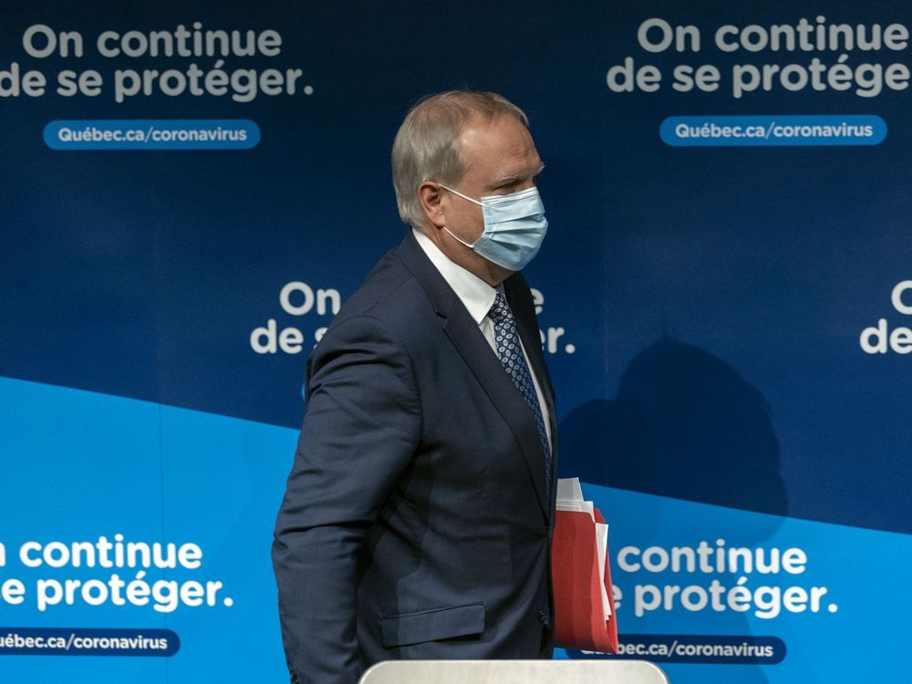 Interim public health director Dr. Luc Boileau leaves a press conference in Montreal on Thursday, January 13, 2022.