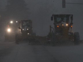 Snow clearing begins in Montreal during the first major snowstorm of the year, Jan. 17, 2021.