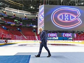 Kent Hughes walks across the Bell Centre ice after a news conference introducing him as the Montreal Canadiens' new general manager in Montreal on Wednesday, Jan. 19, 2022.