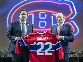 Kent Hughes, right, with Jeff Gorton, executive vice president hockey operations, at a news conference introducing Hughes as the Montreal Canadiens' new general manager at the Bell Centre in Montreal on Jan. 19, 2022.