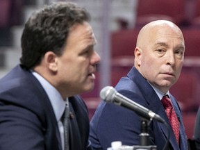 Kent Hughes, right, listens to Jeff Gorton, executive vice president hockey operations at a news conference introducing Hughes as the Montreal Canadiens new general manager at the Bell Centre in Montreal Wednesday Jan. 19, 2022.
