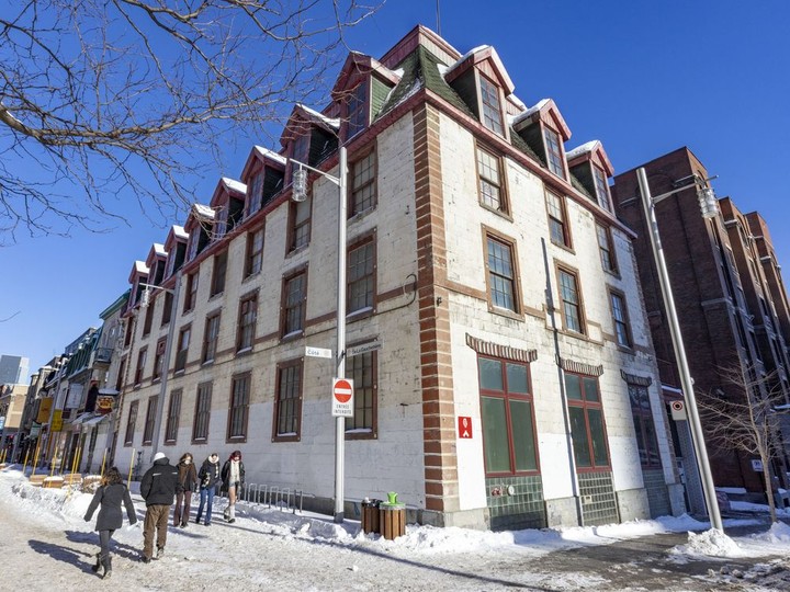  Wing’s Noodle Factory at the corner of de La Gauchetière St. and Côté St. in Montreal’s Chinatown is among the buildings that will receive heritage protection, as will the former Davis tobacco factory, right.