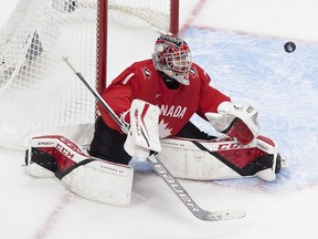 Goalie Devon Levi makes a save against Russia during semifinal action at the World Junior Hockey Championship in Edmonton last year.