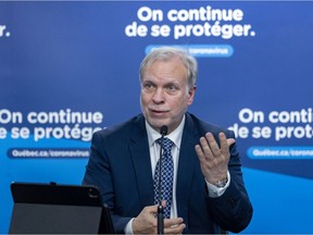Interim Quebec public health director Dr. Luc Boileau speaks at a news conference in Montreal on Thursday, Jan. 27, 2022.