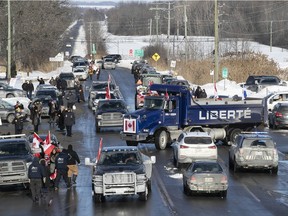 Ottawa-bound "freedom convoy" passes through Rigaud on Jan. 28, 2022.