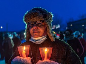 Hanan El Nossery was among the Montrealers to brave the cold and mark the fifth anniversary of the Quebec City Mosque shootings with a community gathering outside Metro Parc in Montreal on Saturday January 29, 2022 to honour the victims. Dave Sidaway / Montreal Gazette ORG XMIT: 67326