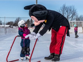Mickey Mouse helped out 2-year-old Margot on the ice at Sunnybrooke Park in Dollard-des-Ormeaux last Saturday as part of the town's winter carnival.