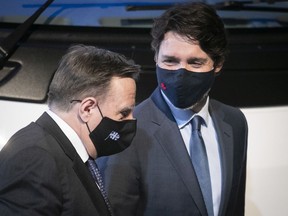 Prime Minister Justin Trudeau and Quebec Premier François Legault at an announcement on March 15, 2021.