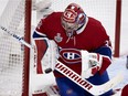 Montreal Canadiens' Carey Price makes a blocker save against Tampa Bay Lightning during Game 3 of the Stanley Cup final, in Montreal on July 2, 2021.