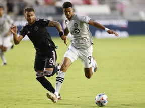 CF Montreal's Bjørn Johnsen, right, dribbles up the field against Leandro Gonzalez of Inter Miami CF during the first half on May 12, 2021, in Fort Lauderdale, Fla.