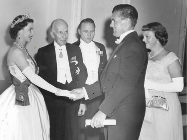 Montreal Canadiens star Maurice (Rocket) Richard shakes hand with Queen Elizabeth at a state dinner at Government House in July 1959. MONTREAL GAZETTE