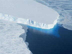 This undated photo courtesy of NASA shows Thwaites Glacier in Western Antarctica, which is melting, and its collapse is predicted to raise global sea level nearly two feet, scientists say.