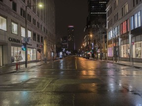 An empty Peel St. at the corner of Ste-Catherine St. Saturday night after 10 p.m.