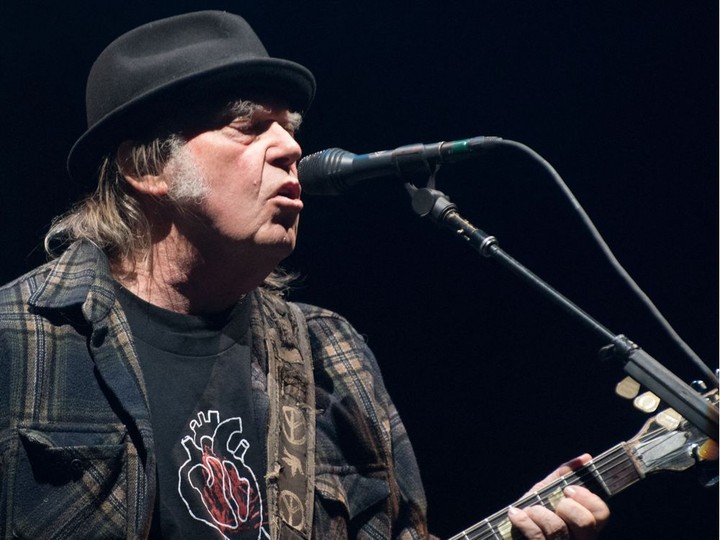  Neil Young performs on stage in Quebec City at the Festival d’été de Québec on July 7, 2018.