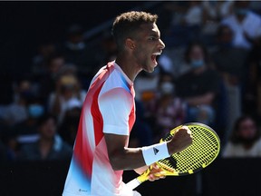 Felix Auger-Aliassime reacts after winning the second set against Croatia's Marin Cilic during their men's singles match at the Australian Open on Jan. 24, 2022.