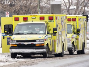 Ambulances are shown outside a hospital amid the global COVID-19 pandemic, in Montreal, Tuesday, Dec. 28.