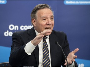 "The idea is to go gradually, prudently, slowly," Premier François Legault said. "We're all aware many Quebecers are fed up, they're fed up of the restrictions, it's been 22 months."