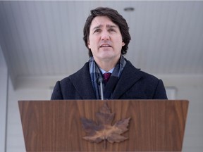 Prime Minister Justin Trudeau, who said that he had tested positive for COVID-19, speaks during a media availability held at a location which is not being made public for security reasons, near Ottawa, January 31, 2022.