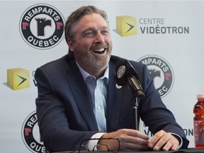Hall of Fame goaltender Patrick Roy smiles as he announces his return to the Quebec Remparts as general manager and head coach on April 26, 2018, in Quebec City.