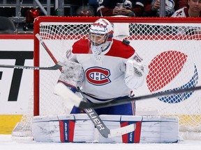 Canadiens goaltender Cayden Primeau gives up a goal to the Colorado Avalanche in the first period at Ball Arena on Saturday, Jan. 22, 2022, in Denver.