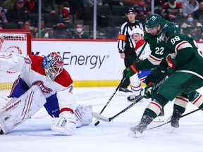 Minnesota Wild left-wing Kevin Fiala (22) scores on Montreal Canadiens' Michael McNiven during the third period at Xcel Energy Center on Jan. 24, 2022; Saint Paul, Minn.