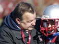 Bob Mironowicz, who died Jan. 7, 2022, is pictured here coaching a player during a Lakeshore Cougars peewee football game in 2010.