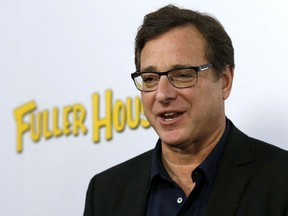 Cast member Bob Saget poses at the premiere for the Netflix television series Fuller House at The Grove in Los Angeles on Feb. 16, 2016.