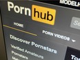 The Pornhub website is shown on a computer screen.