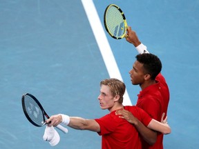 Canada's Felix Auger-Aliassime and Denis Shapovalov celebrate winning their semi final doubles match against Russia's Daniil Medvedev and Roman Safiullin.