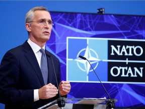 NATO Secretary General Jens Stoltenberg speaks during a news conference at the Alliance's headquarters in Brussels, Belgium Jan. 12, 2022.